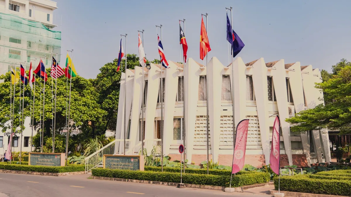 The IISPP International Hall with a row of national flags